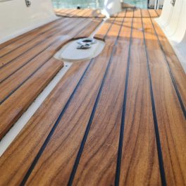 Teak burkolat